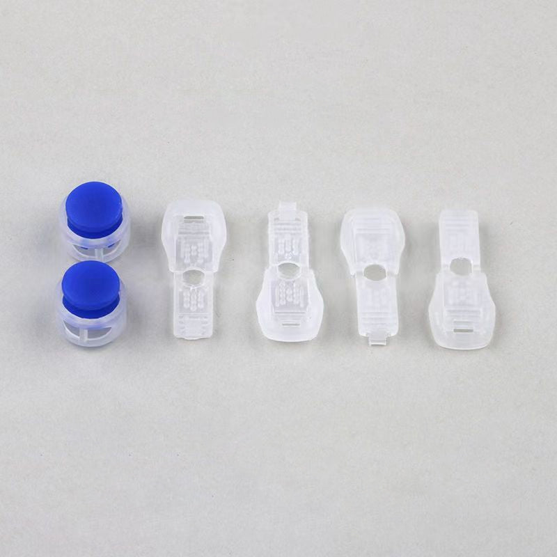 QuickTie™ - Hebilla con resorte para cordones