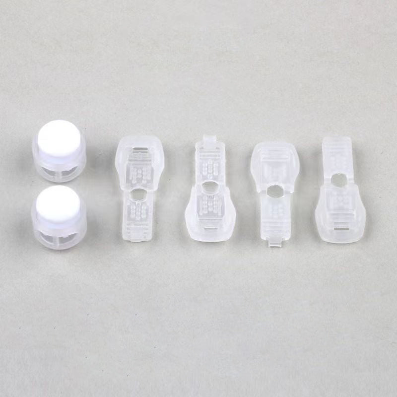 QuickTie™ - Hebilla con resorte para cordones