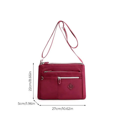 Eleganza™ - Cartera de mano multifuncional